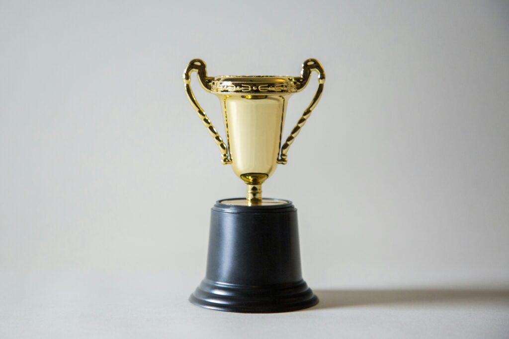 a trophy, signifying success